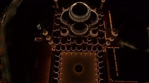 Aerial view of grand mosque illuminated at night, Turkey.