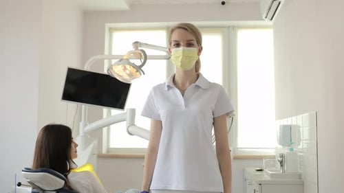 Dental Assistant Standing Proudly in Modern Clinic