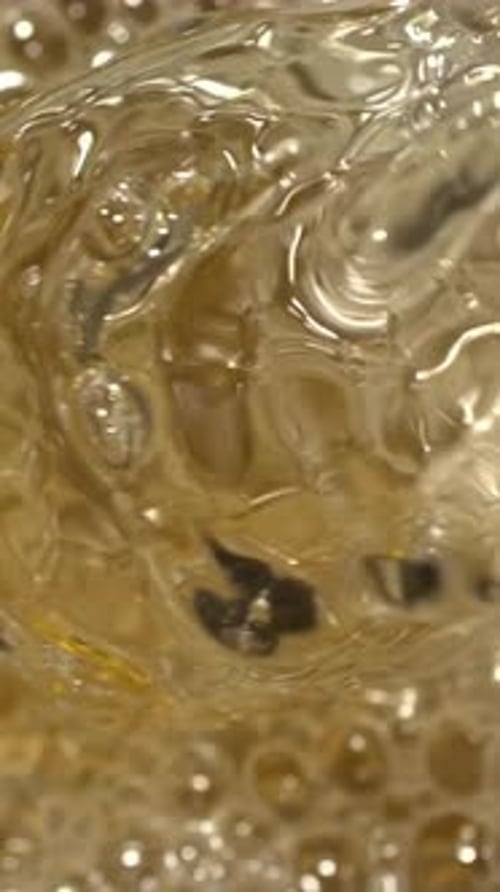 Vertical View Of Beer into Glass