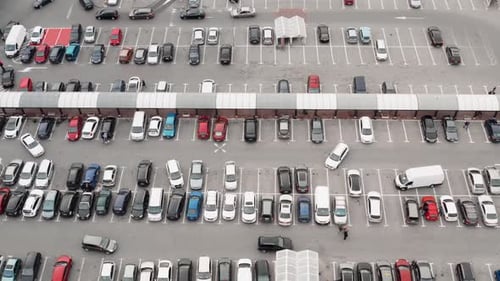 Aerial View Parking Near Big Shopping Mall in City Car Traffic Parking Overhead Drone Top Down View