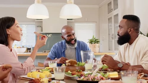 Family and Friends Enjoying Meal at Dining Table