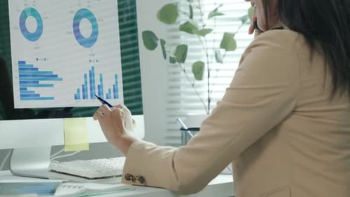 businesspeople working and brainstorming in office