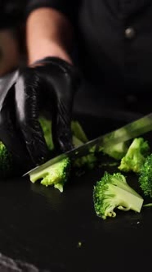 The chef prepares a vegetable dish. Cooking broccoli