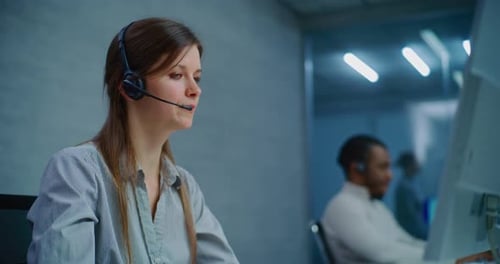 Close Up of Female Technical Support Specialist in Headset Providing Online Customer Service