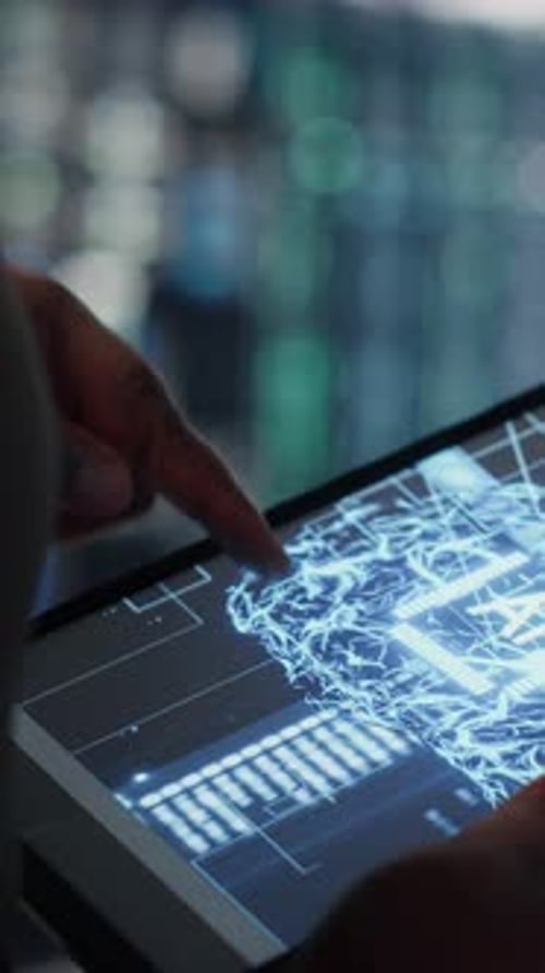 Vertical Video Lose Up of Data Center Technician Doing AI Data Analysis on Tablet