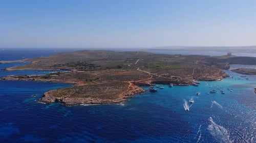 Aerial Panorama of Comino and Blue Lagoon Malta with Boats