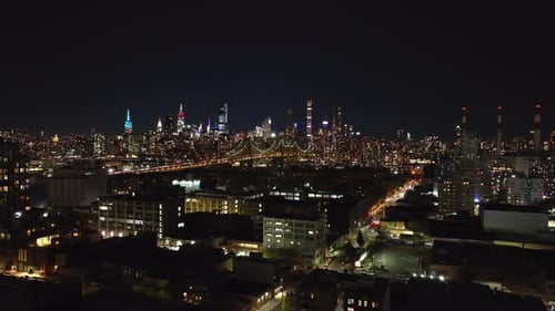 Captivating Midtown Manhattan Skyline Shines Brightly Against the Night Sky Showcasing Iconic