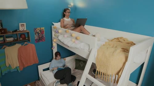 Two Young Women Sharing Bedroom