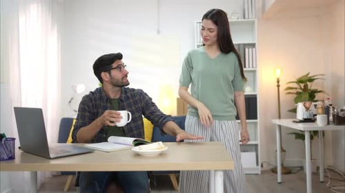 Couple Working Together from Home Office