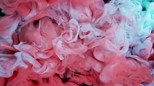 Vibrant Turquoise and Red Ink Plumes on Black