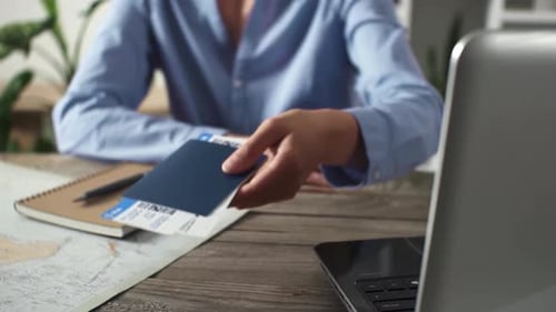 A Woman Travel Agency Manager Issues Tickets For Traveling The Warm Summer Season To Other Countries