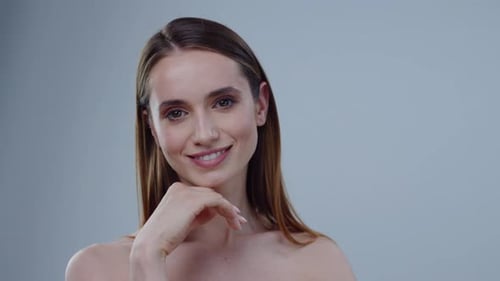 Beautiful Woman Smiling in Studio Close Up