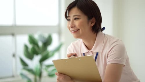 Cheerful Woman with Clipboard in Bright Indoor Setting