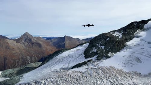 Saas Fee Saastal summer autumn fall dirty brown glacier drone flight flying over Switzerland Swiss A