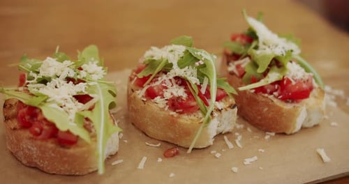 Delicious Bruschetta Sourdough Toast with Cherry Tomatoes Cheese and Arugula