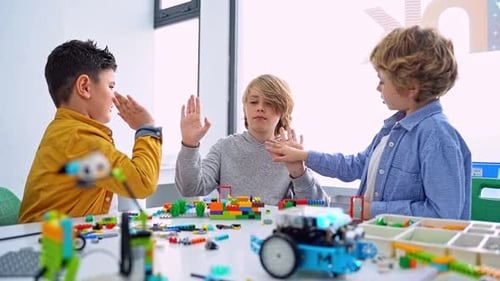 Robotics Programming Class Children Construct and Code Robot STEM Education Using Constructor Blocks