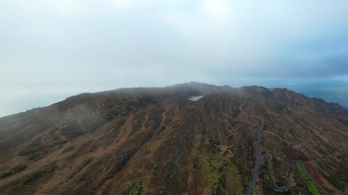 Ireland Epic Locations aerial view of lake on mountain top in rural ireland winter in Sheeps Head We
