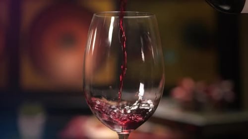 Wine Pouring into Glass in Close Up