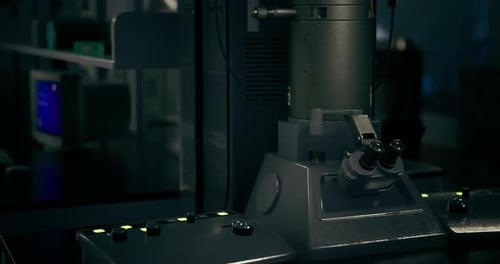 Technological Apparatus in a Dimly Lit Research Facility During Evening Hours