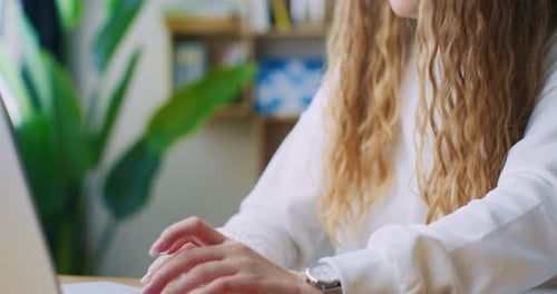 Typing on Laptop in Home Office Close Up