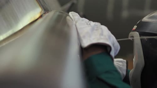 Welder, using VIG, TIG, MIG MAG method to welding stainless steel parts, close up. The welder uses a