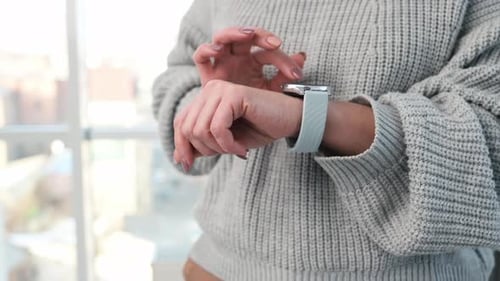 Woman Using Smartwatch Device Indoors Close Up