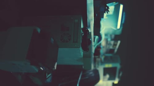 Futuristic Robotic Arm Operating Industrial Control Panel