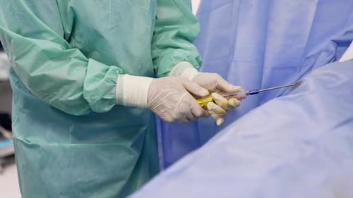 Surgeons Performing Procedure in the Operating Room