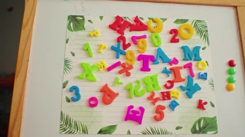 Bright Colored Letters and Numbers on White Board