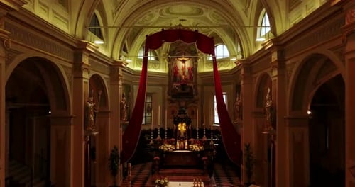 Lodi, Italy - 12 May 2018: Aerial view with drone inside a Christian church. Inside you can see cr