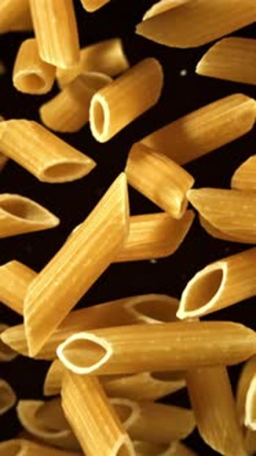 Super Slow Motion Flying Dry Penne Pasta Filmed on a Highspeed Camera at 1000 Fps