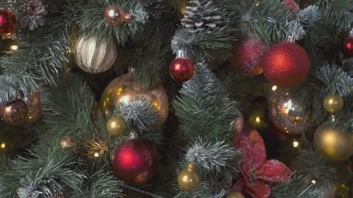 Christmas Tree Decorated with Red and Gold Ornaments