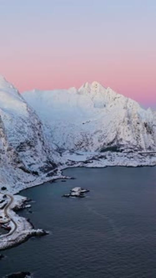 Snowy Lofoten Mountains And Fjord At Pink Golden Hour