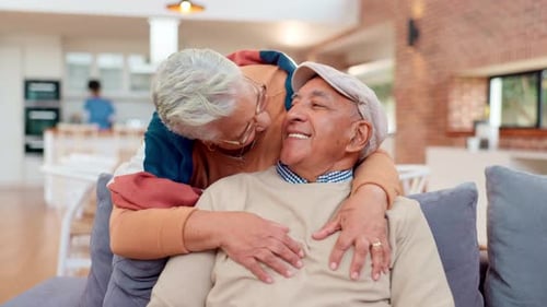 Affectionate Senior Couple Hugging and Kissing