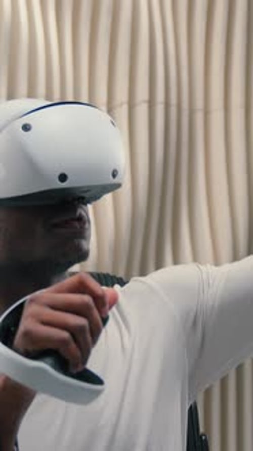 Man Using VR Headset in Minimalist Room