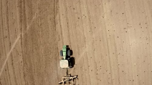 Tractor tilling in Judea Plain, Drone footage, Israel