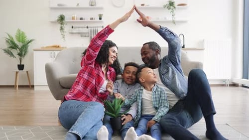 Adults Making House By Raised Arms with Kids Inside
