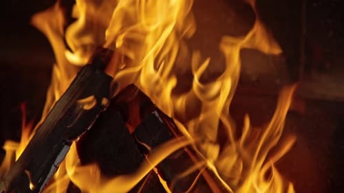 Fire Burning Brightly in Fireplace Close Up