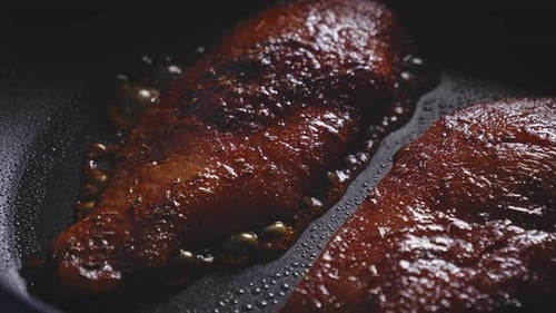 Chicken Sizzling in a Hot Pan