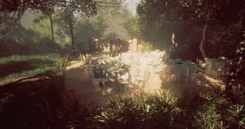 Elegant Outdoor Dining Setup in a Serene Garden During Daytime