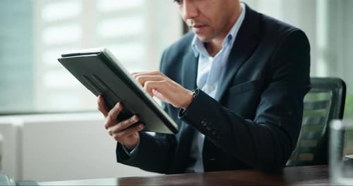 Businessman, tablet and scrolling in office for communication, news article