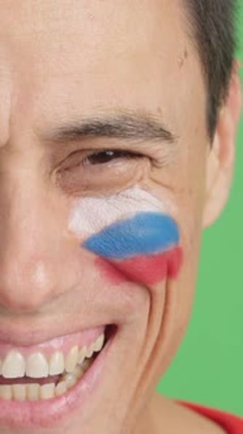 Smiling Adult Face with Painted National Flag