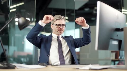 Mature businessman Employee in suit job done Satisfied office worker leaning back business man relax