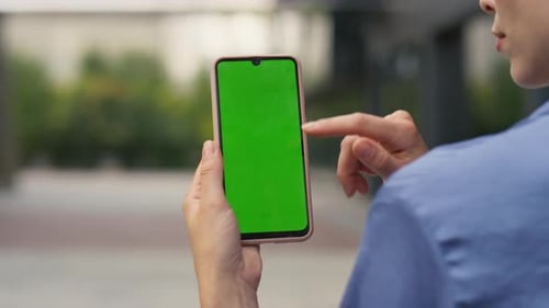 Woman Finger Swiping Chroma Key Mobile Phone Closeup Manager Holding Smartphone