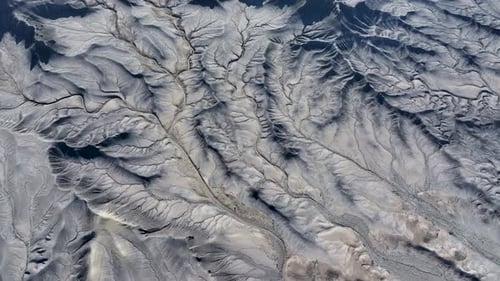 Aerial view of rugged landscape and rock formations, USA.