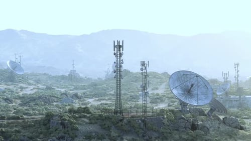Satellite Dishes on a Green Hillside Capturing Signals From Space