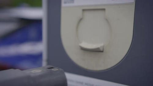 Charching Electric Car on Pulic Charching Station Using A Cable Connection