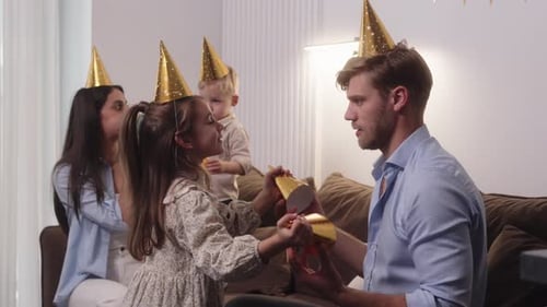 Family Celebrates Birthday Together at Home