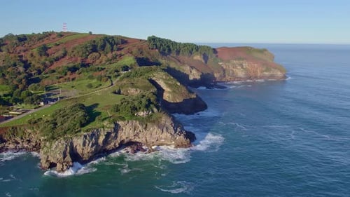 Rocky Cliffs By The Cantabrian Coastline Of Isla City, Aerial Spain.
