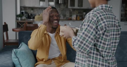 Man Receives a Birthday Gift with Joy